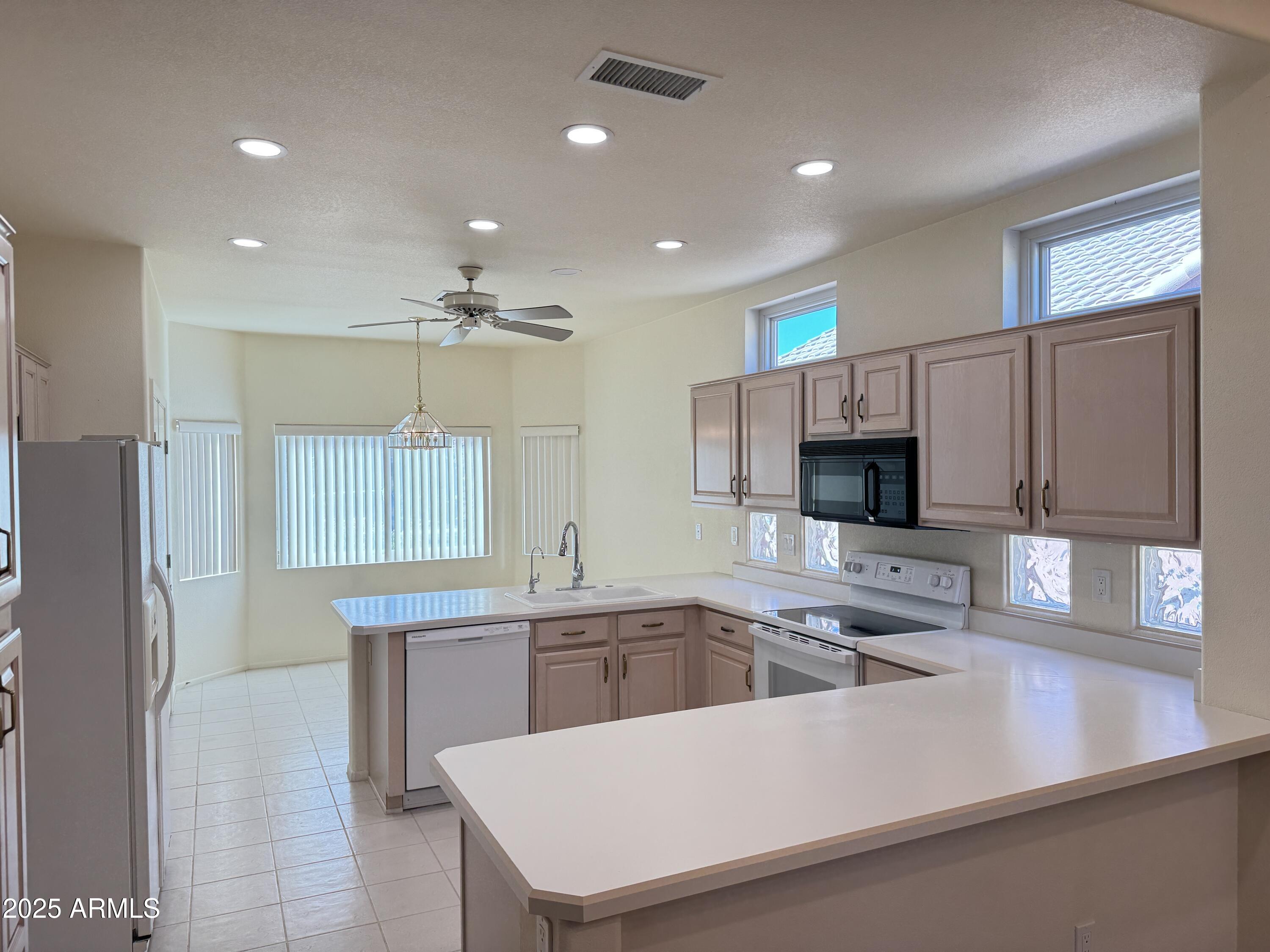 13706 W CABALLERO Drive, Sun City West, AZ 85375 — Photo 1 of 10