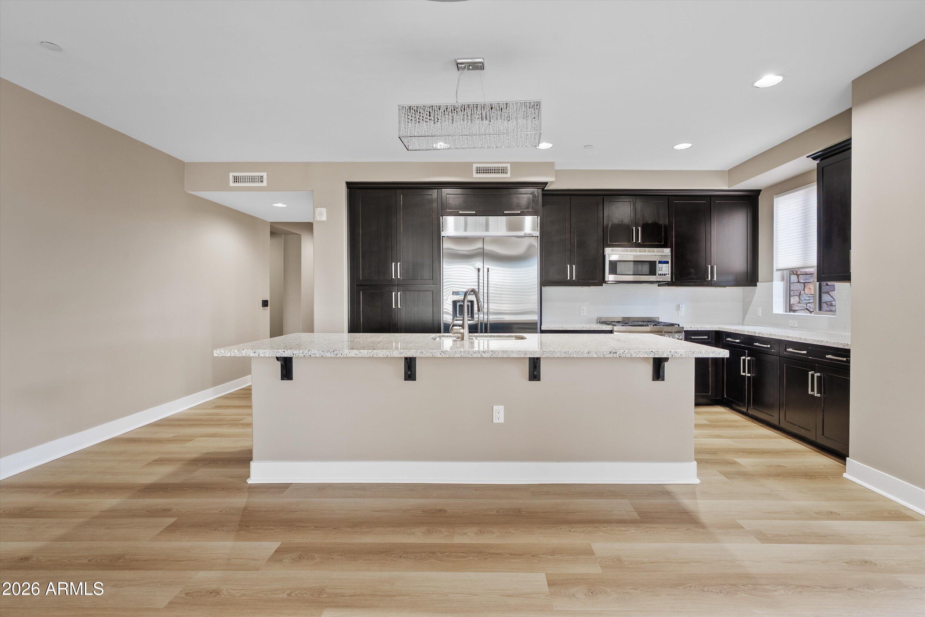 4805 N WOODMERE FAIRWAY 1002, Scottsdale, AZ 85251 — Photo 1 of 38