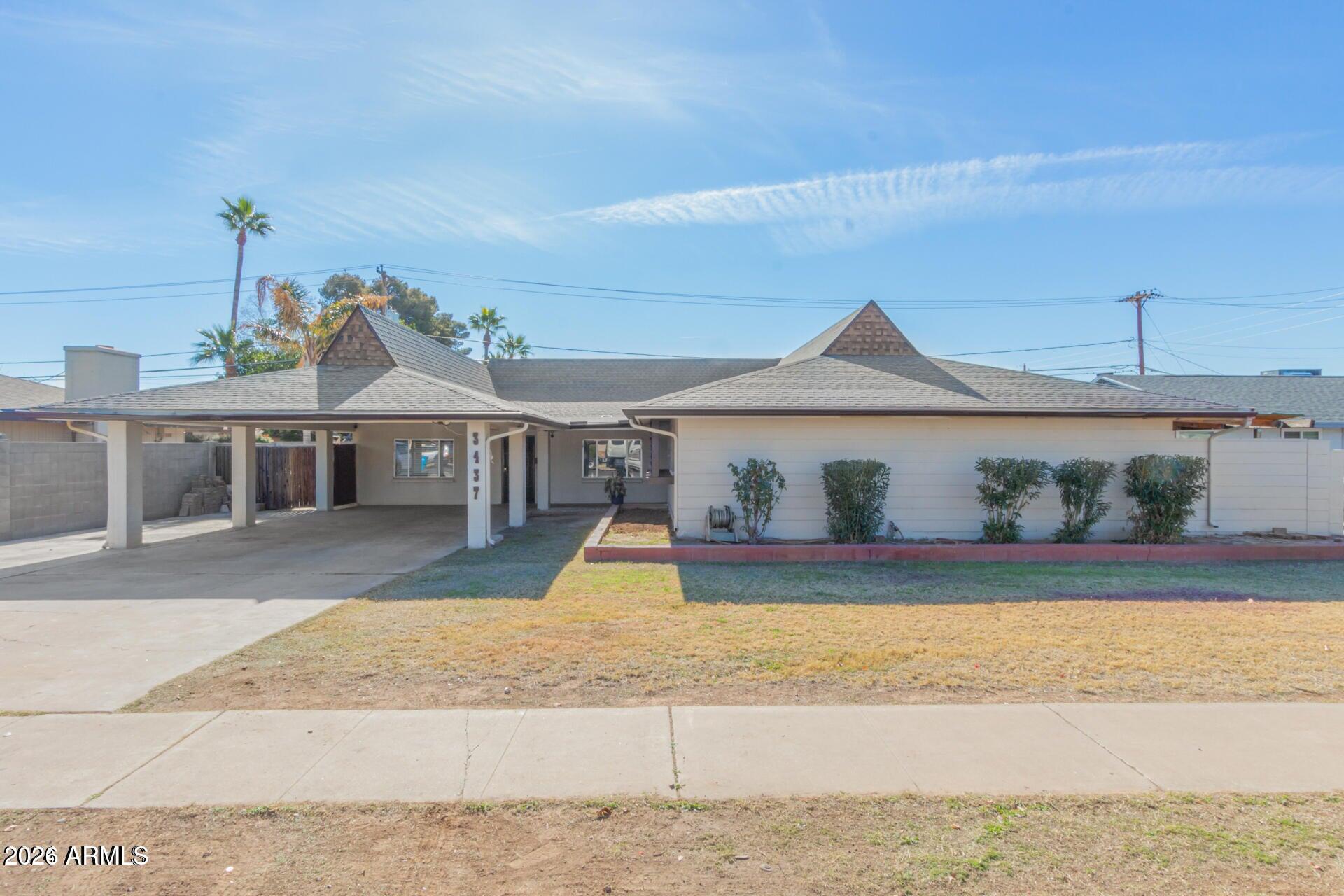 3437 W BELMONT Avenue, Phoenix, AZ 85051 — Photo 1 of 11