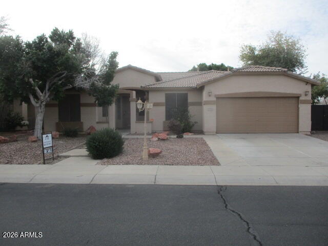 7585 W TUMBLEWOOD Drive, Peoria, AZ 85382 — Photo 1 of 14