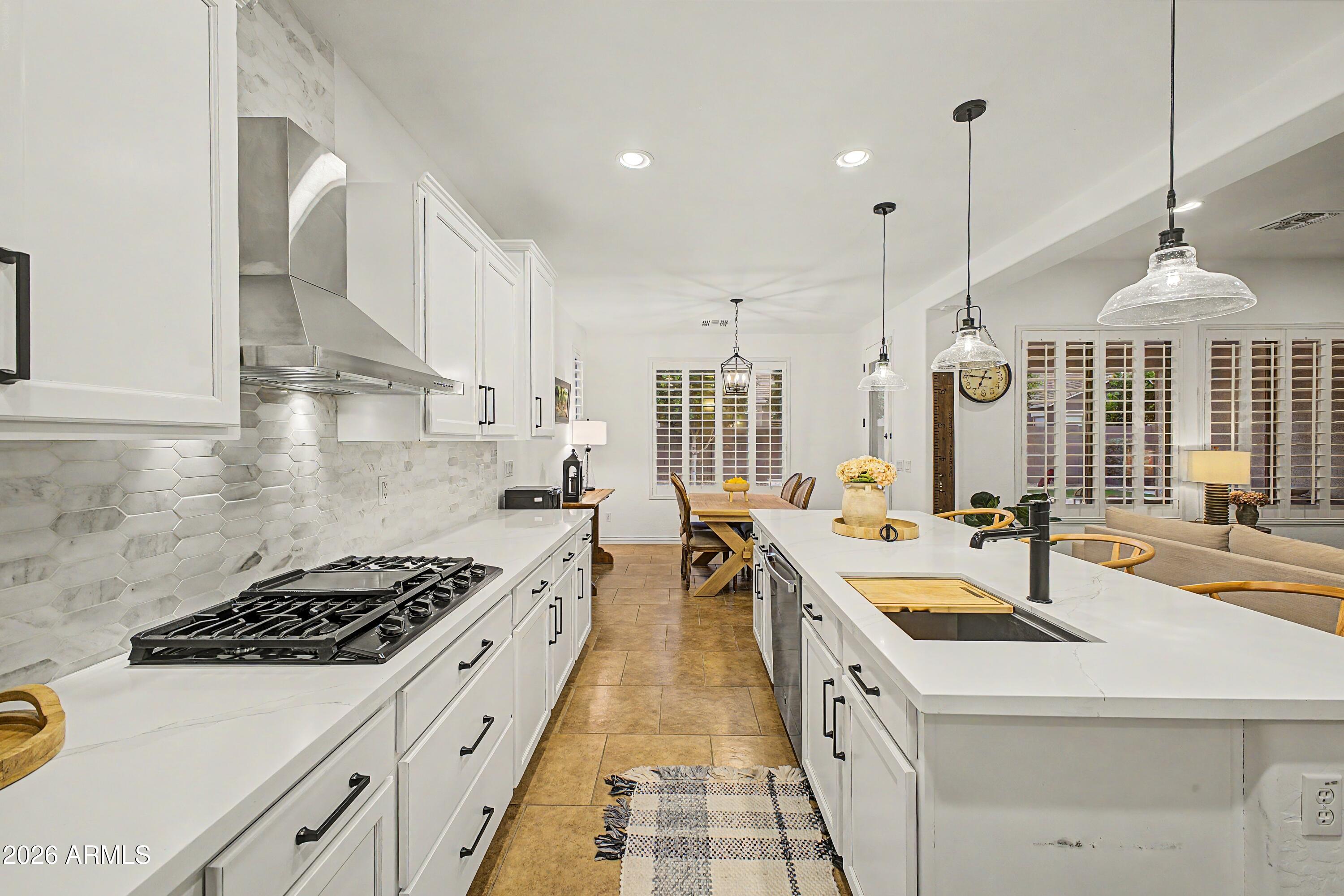 3853 E COMSTOCK Drive, Gilbert, AZ 85296 — Photo 1 of 32