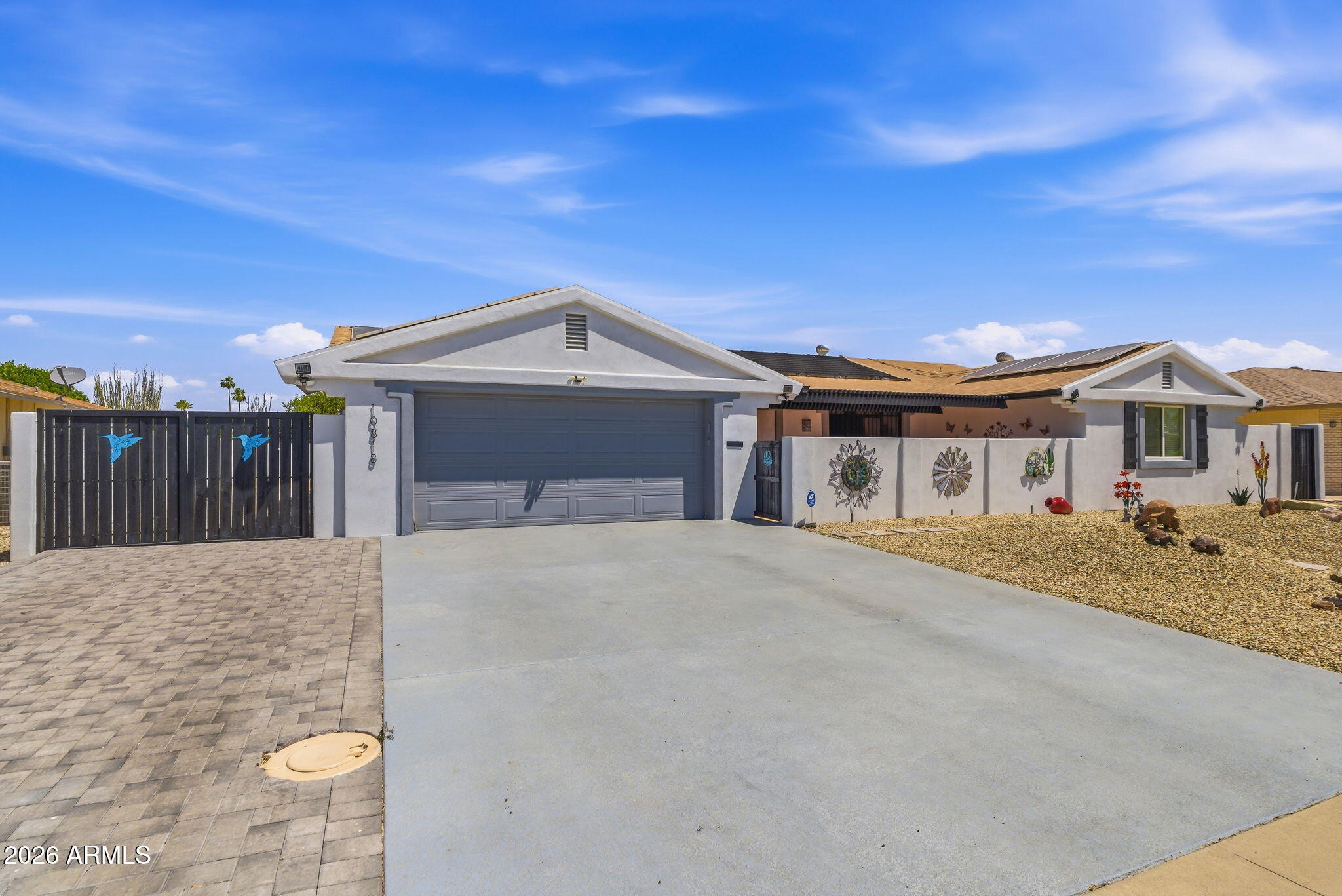 10818 W BROOKSIDE Drive, Sun City, AZ 85351 — Photo 1 of 84