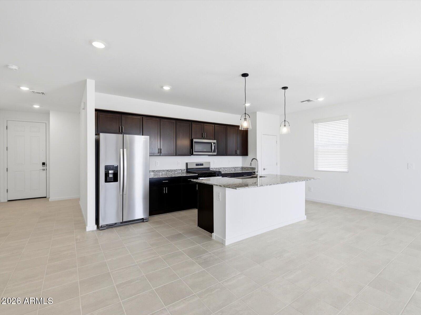 17785 W WOODLANDS Avenue, Goodyear, AZ 85338 — Photo 1 of 42